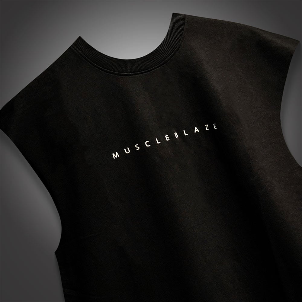 https://img10.hkrtcdn.com/40806/prd_4080599-MuscleBlaze-B.D.S.M-Oversized-Tank-Medium-Black_o.jpg