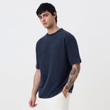 https://img10.hkrtcdn.com/43345/prd_4334449-MuscleBlaze-Lifting-Club-Oversized-Washed-TShirt-Small-Blue-Tint_o.jpg