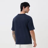 https://img10.hkrtcdn.com/43345/prd_4334499-MuscleBlaze-Lifting-Club-Oversized-Washed-TShirt-Small-Blue-Tint_o.jpg