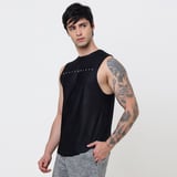 https://img10.hkrtcdn.com/43498/prd_4349749-MuscleBlaze-Camo-DryFit-Delt-Tank-Black-Large_o.jpg