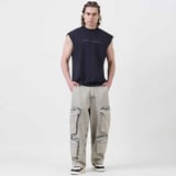 https://img10.hkrtcdn.com/43515/prd_4351489-MuscleBlaze-B.D.S.M-Oversized-Tank-Large-Charcoal_o.jpg
