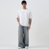 https://img10.hkrtcdn.com/43545/prd_4354459-MuscleBlaze-Natty-But-Tasty-Oversized-Solid-TShirt-Large-White_o.jpg