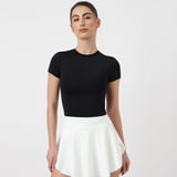 https://img10.hkrtcdn.com/44131/prd_4413019-ZVERSE-MotionSculpt-Training-Top-Black-Riot-Medium_o.jpg