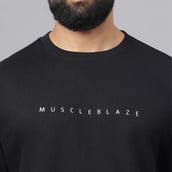 1 - MuscleBlaze Carnage Oversized Tshirt, Black Large
