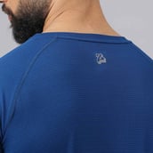 8 - MuscleBlaze Patterned Dry-Fit Active Tee Half Sleeve,  Poseidon  X-Large